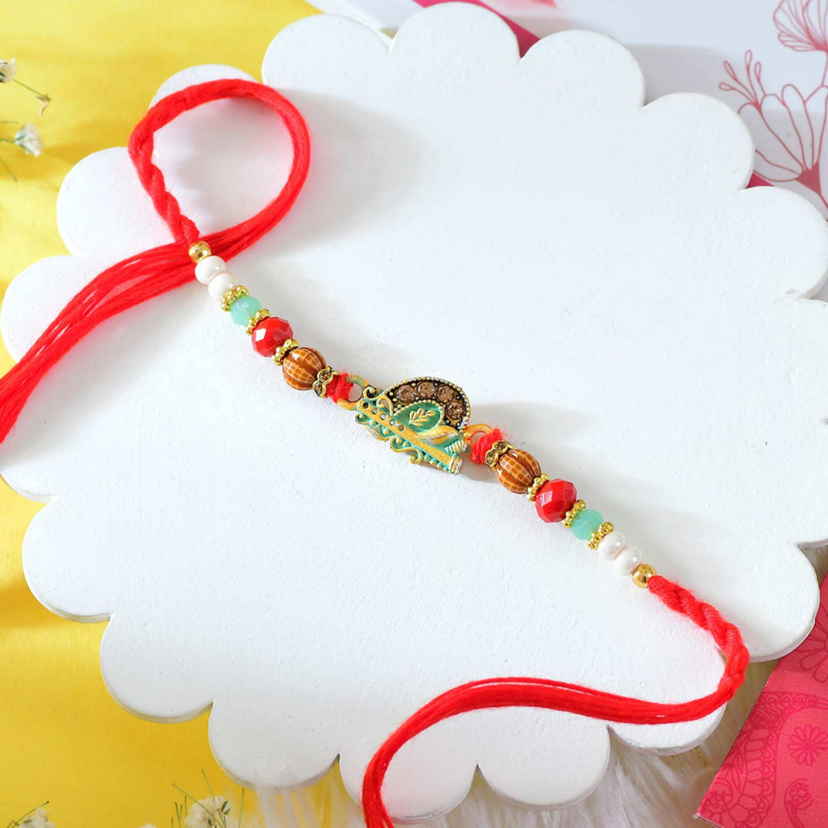 Krishna Bansuri Rakhi With Toblerone Chocolate