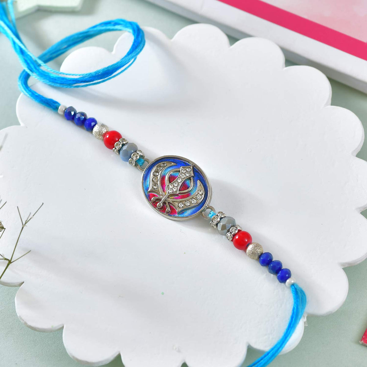 Divine Rakhi With Guru Nanak Silver Coin 10gm