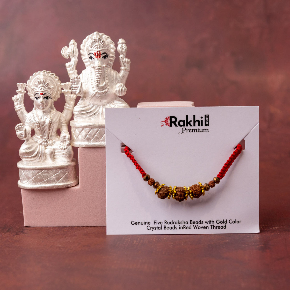 Premium Rudraksh Rakhi with Silver Laxmi Ganesha Statue (999)
