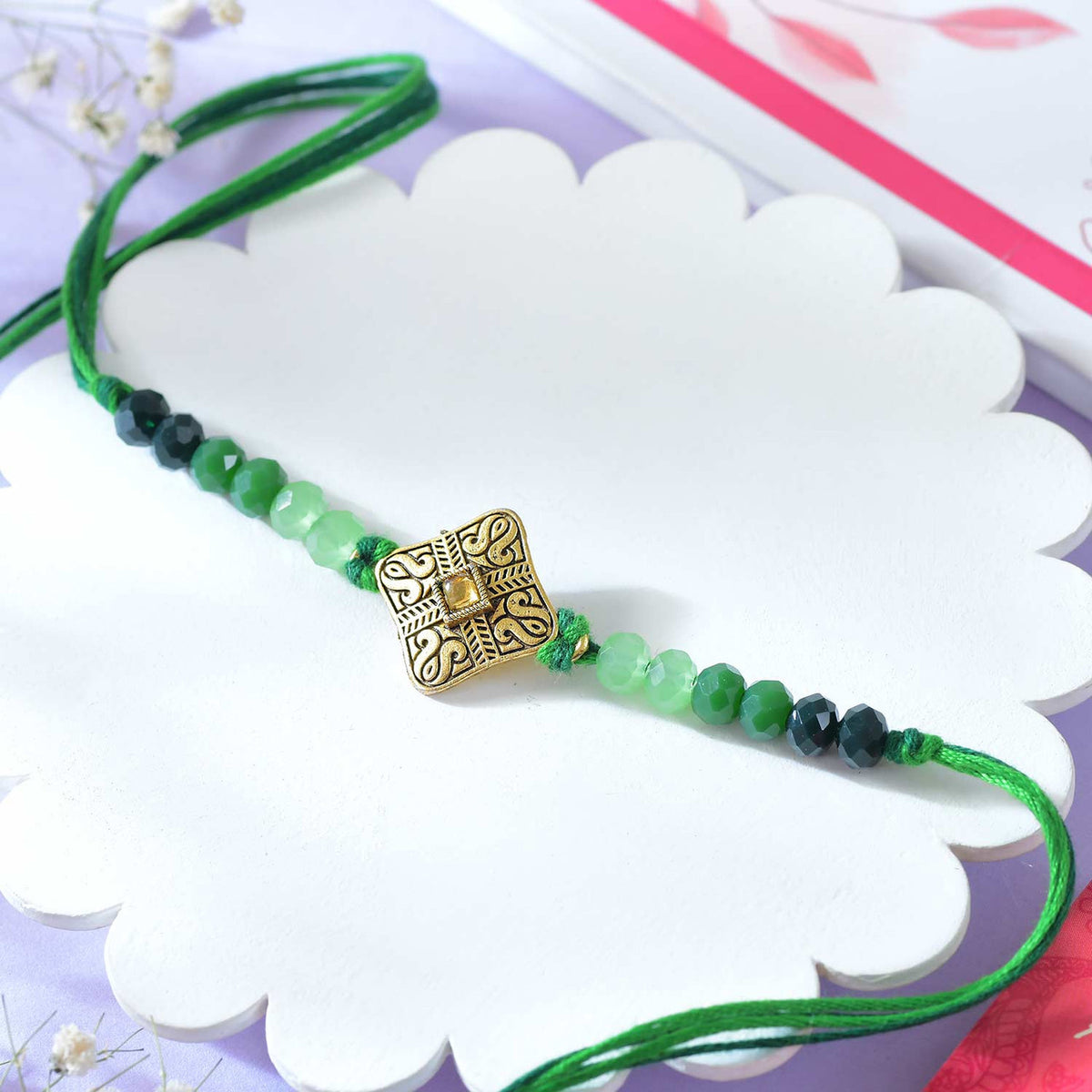 Alluring Single Rakhi with Besan Laddoo & Chocolate