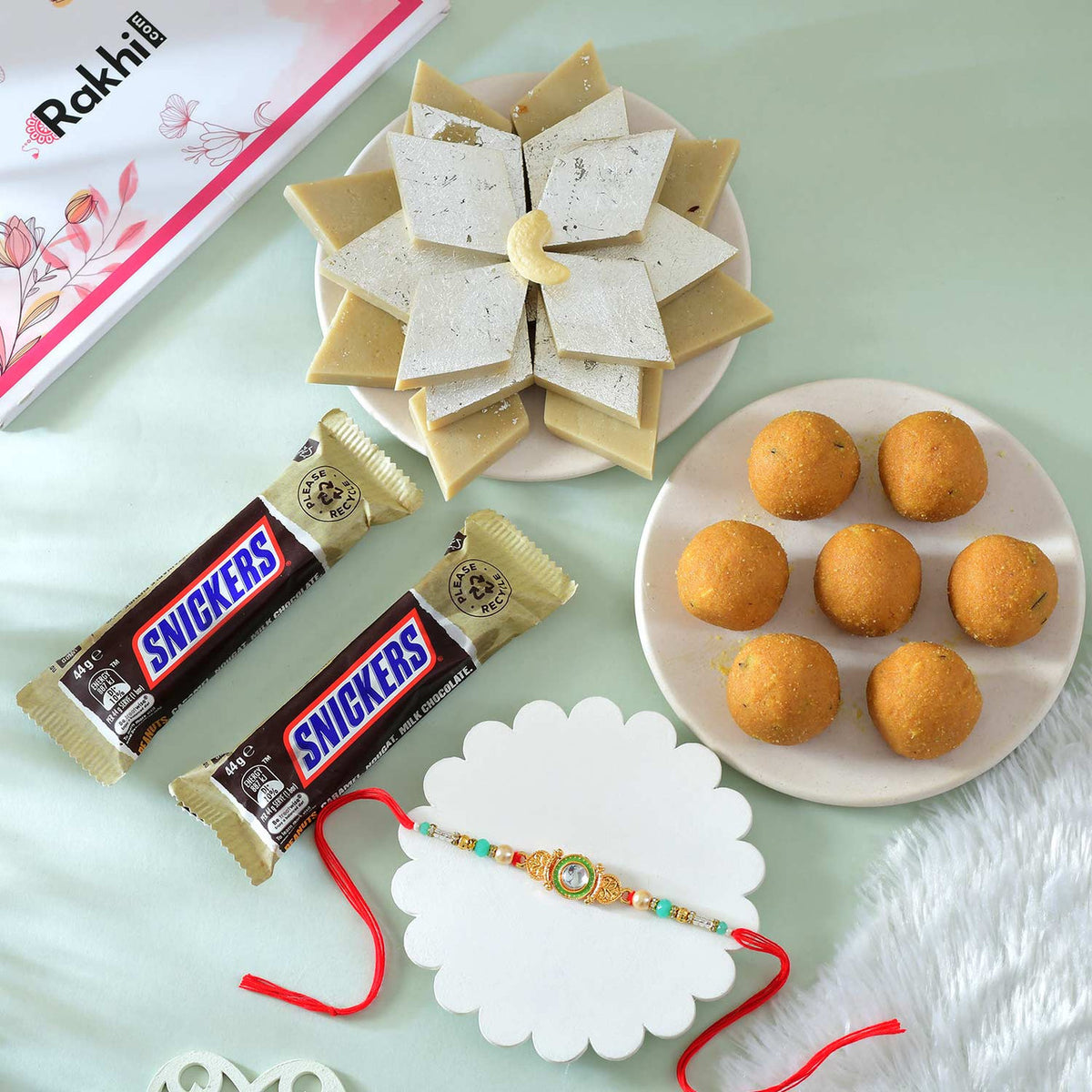 Exquisite Single Bhai Rakhi with Gourmet Hamper