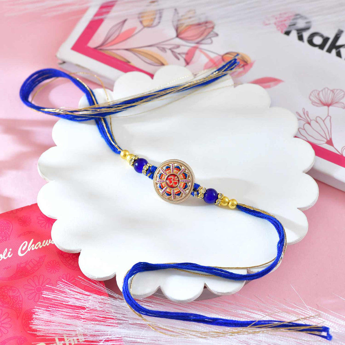 Divine Om Rakhi with Royal Blue Thread