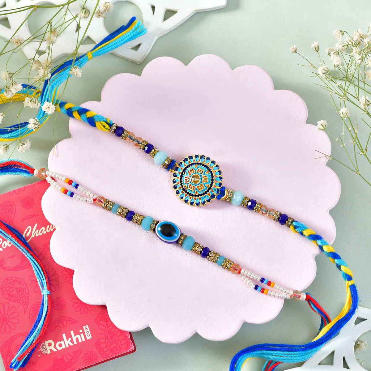 Set of 2 Rakhis With Assorted Gourmet Hamper