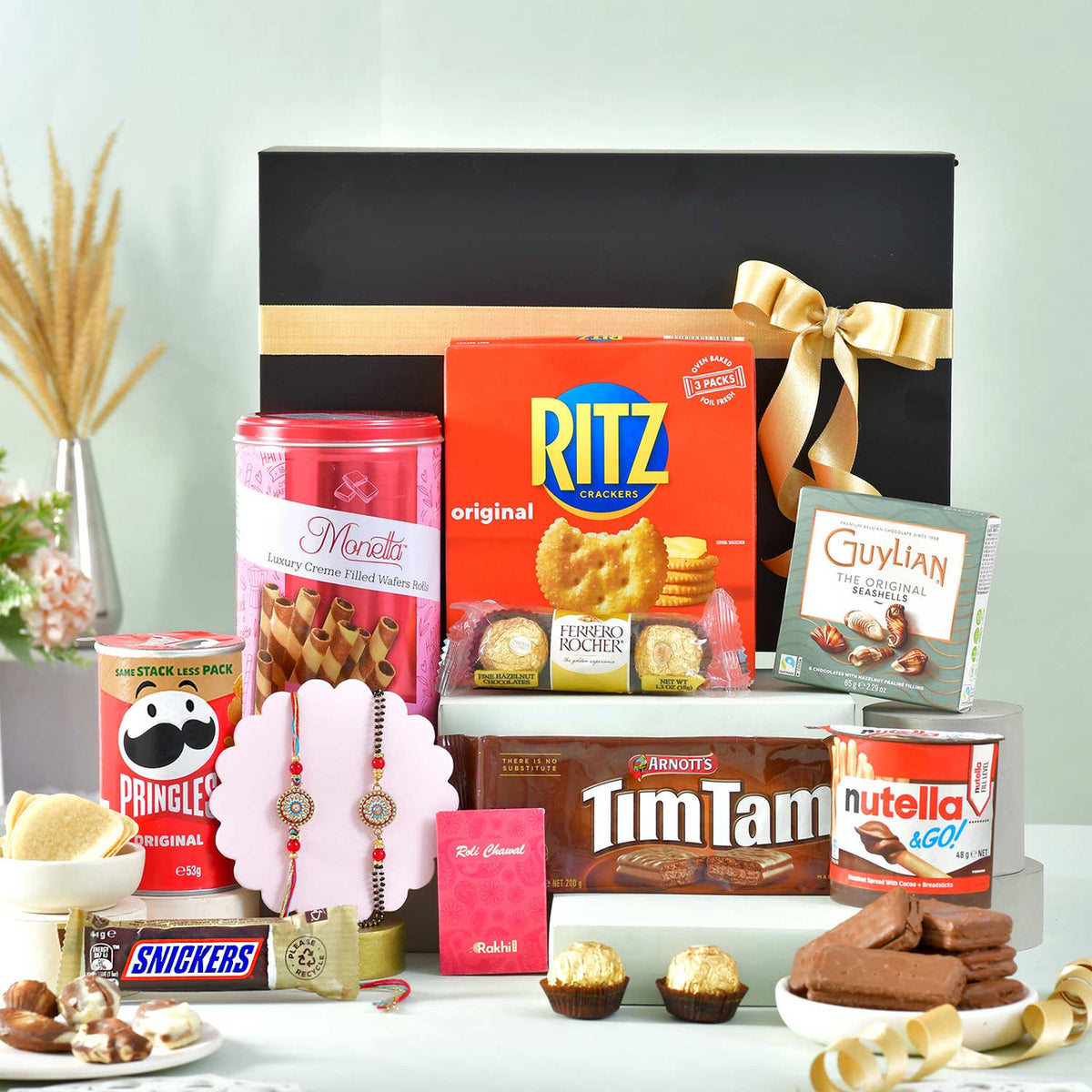 Deluxe Rakhi Gift Hamper with Snacks & Chocolates