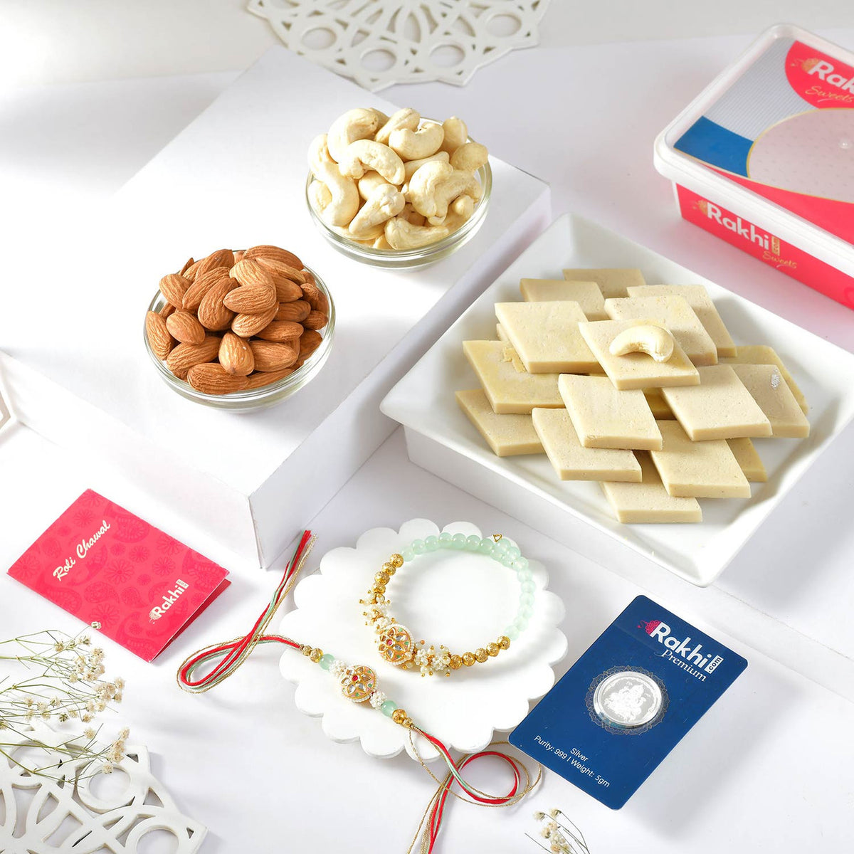 Premium Bhaiya-Bhabhi Rakhi Set with Kaju Katli, Dry Fruits & Silver Coin