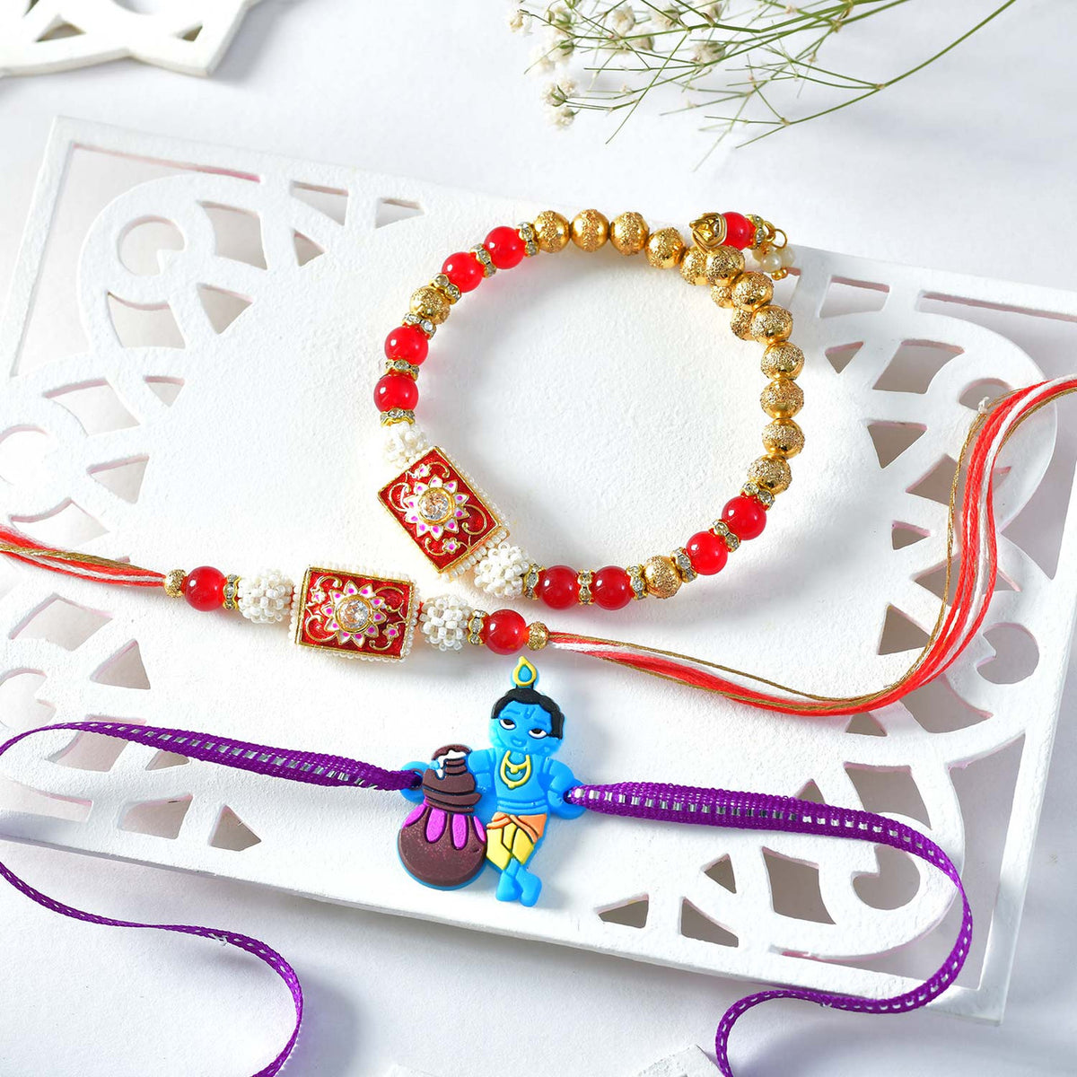 Divine Trio Rakhi Set with Chocolates & Kaju Katli