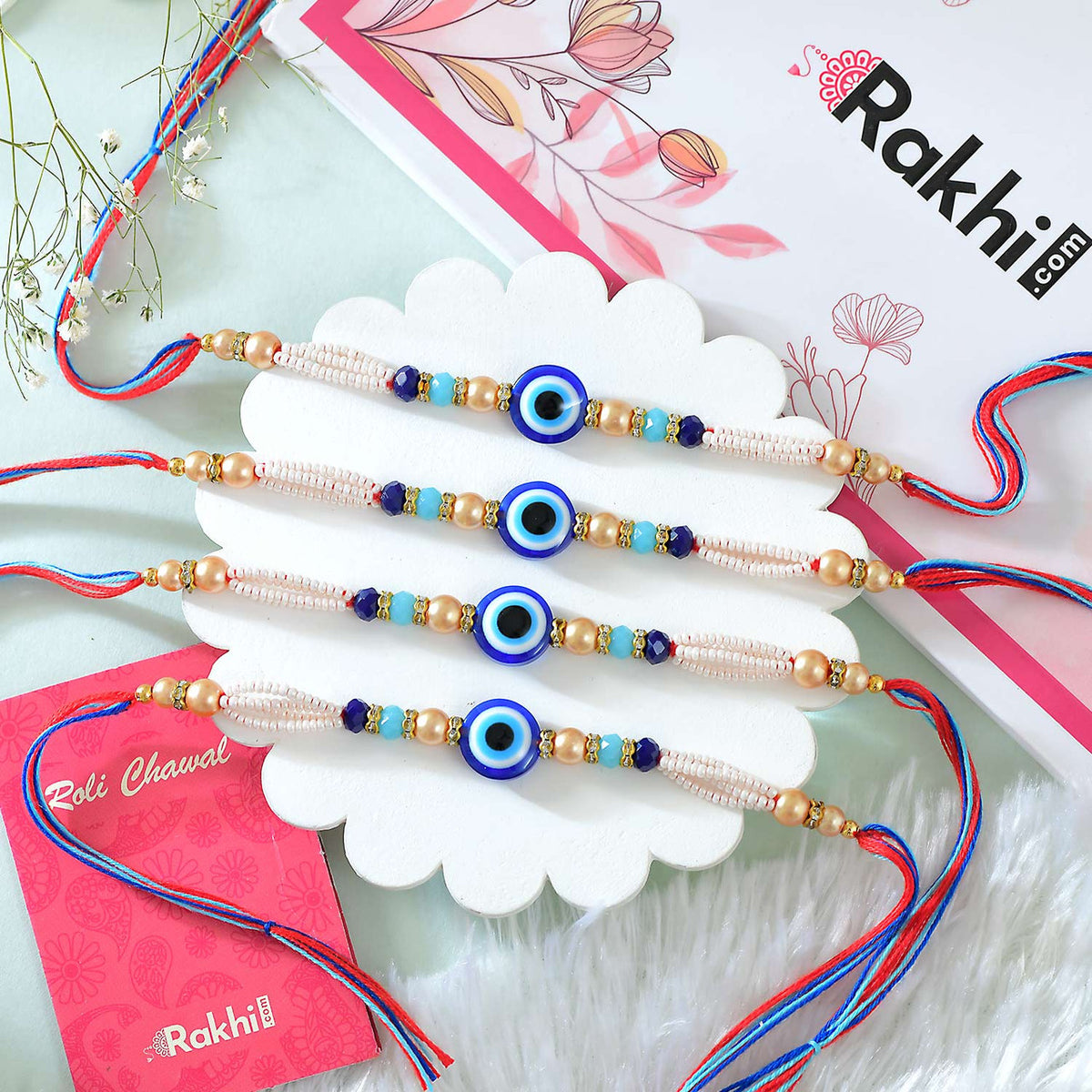 Set of 4 Evil Eye Rakhi With Besan Laddoo & Almond