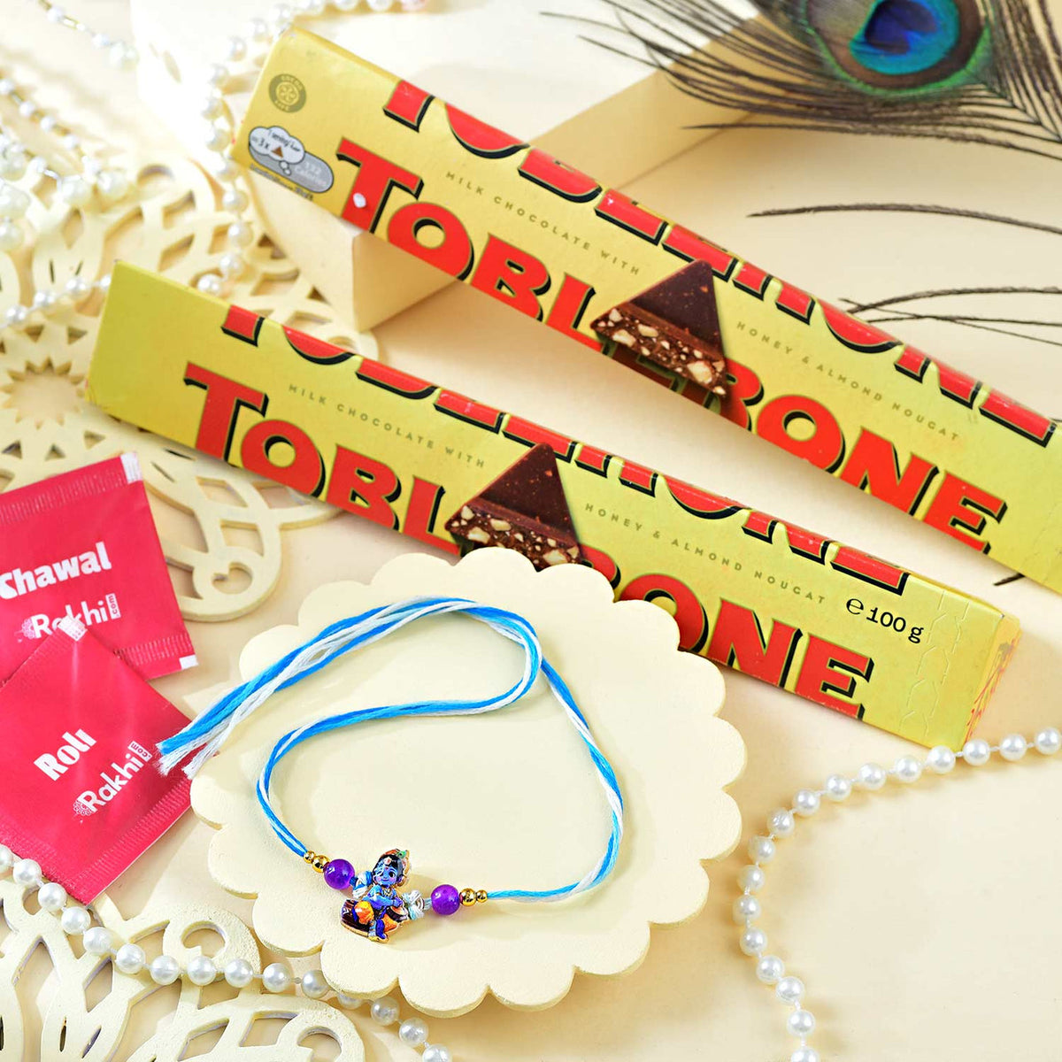 Little Krishna Kid's Rakhi With Toblerone Chocolates